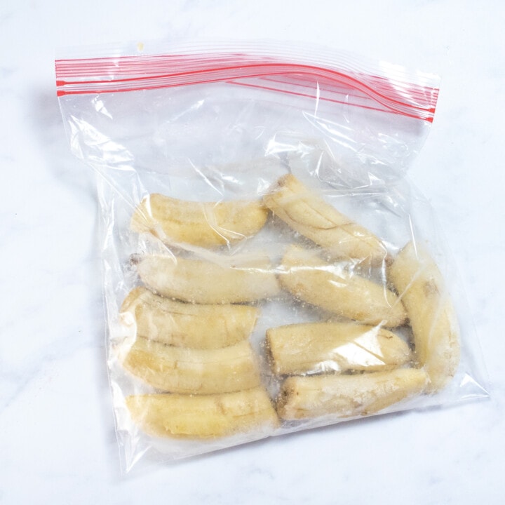 A bag of frozen banana halves.