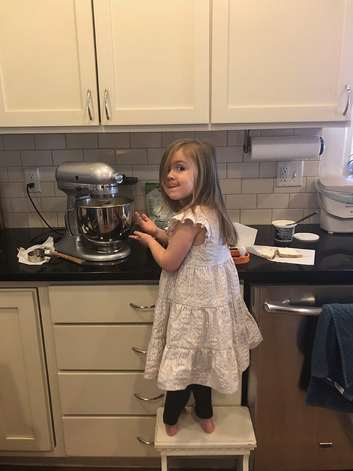girls baking at home for an easy toddler and kid project.